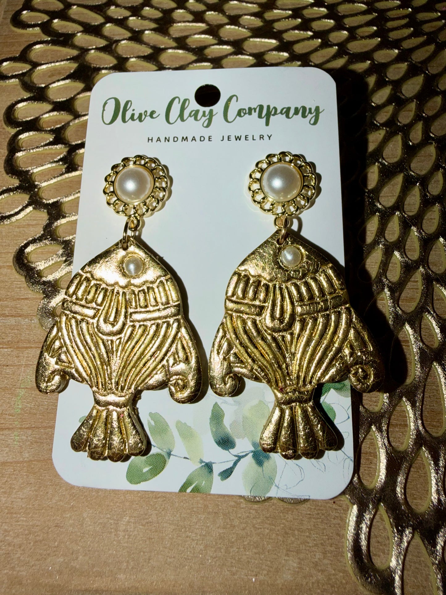 Gold leaf fish earrings