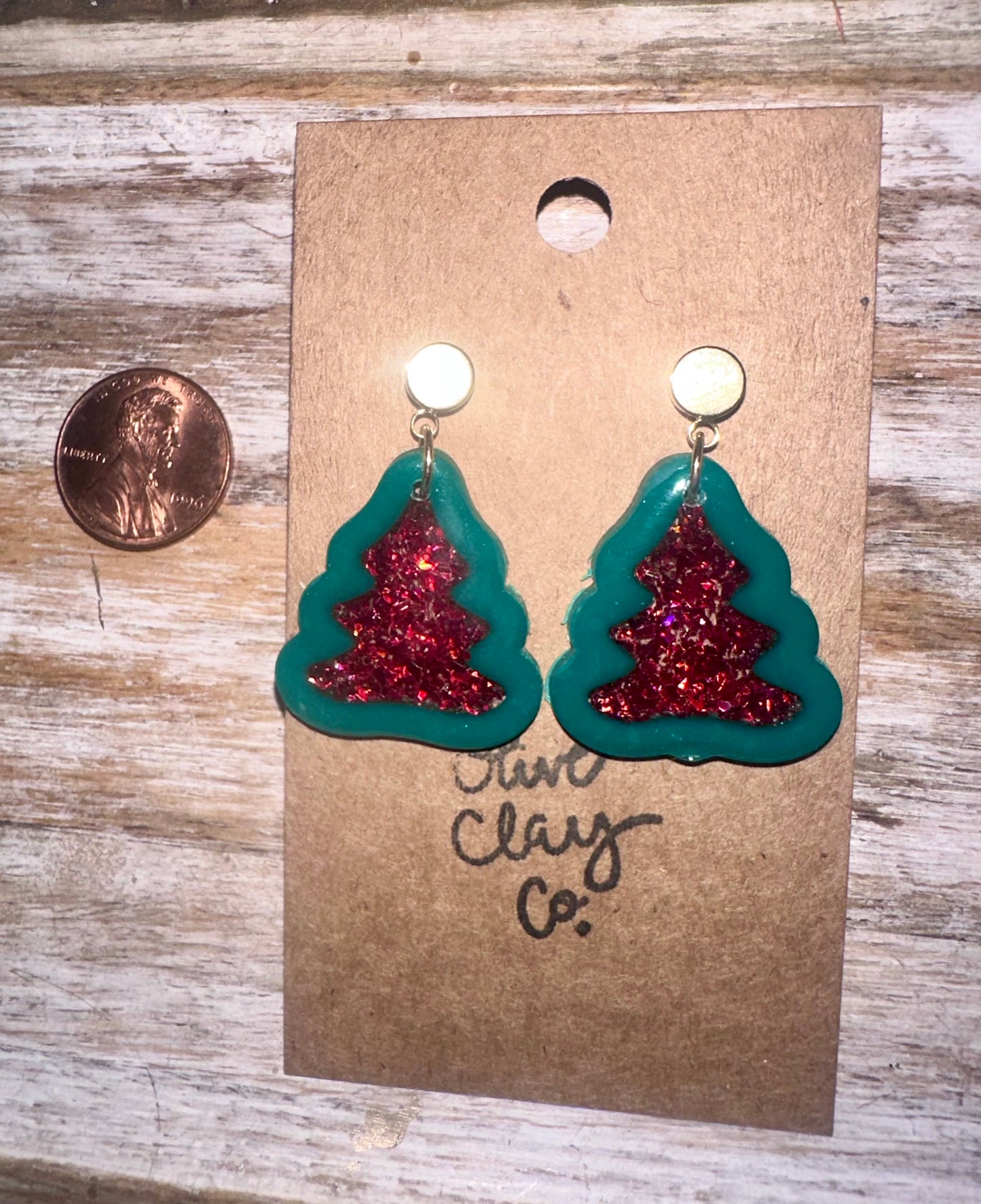 Small clay and resin Christmas trees