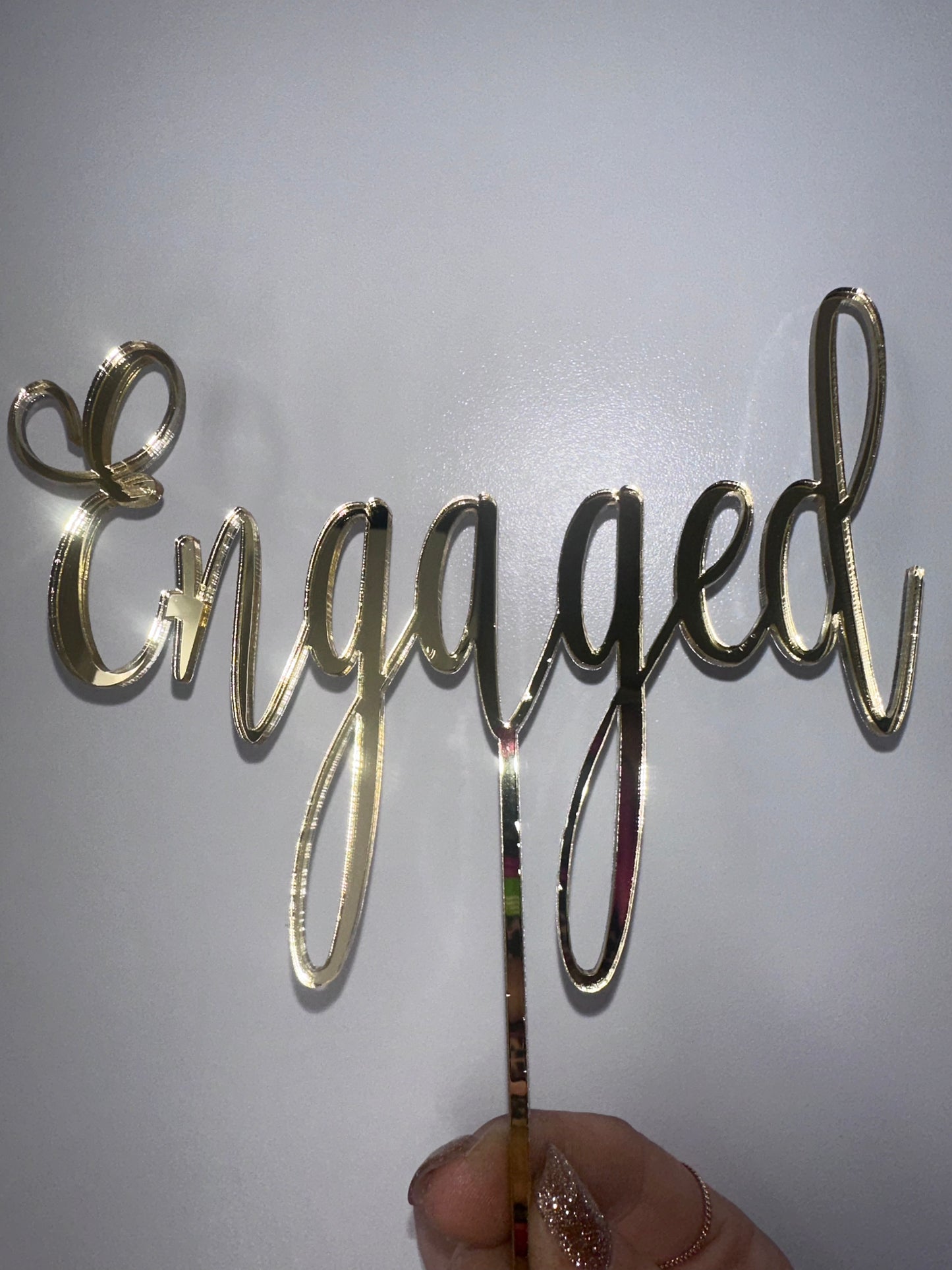 Engaged cake topper