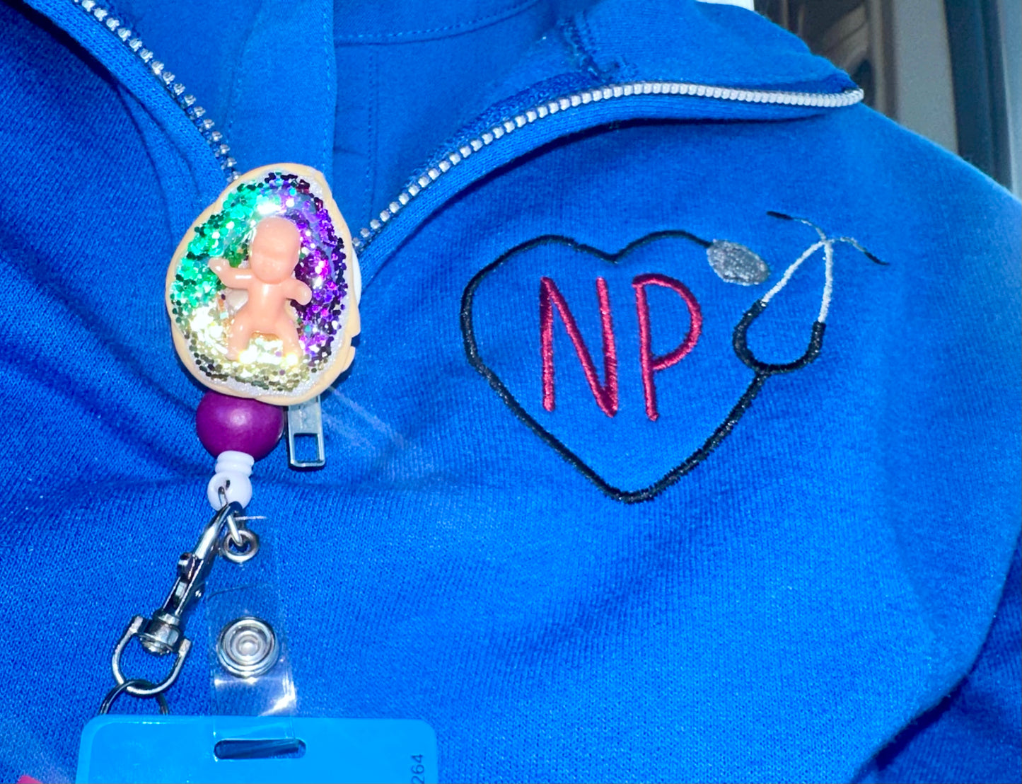 King cake badge reel