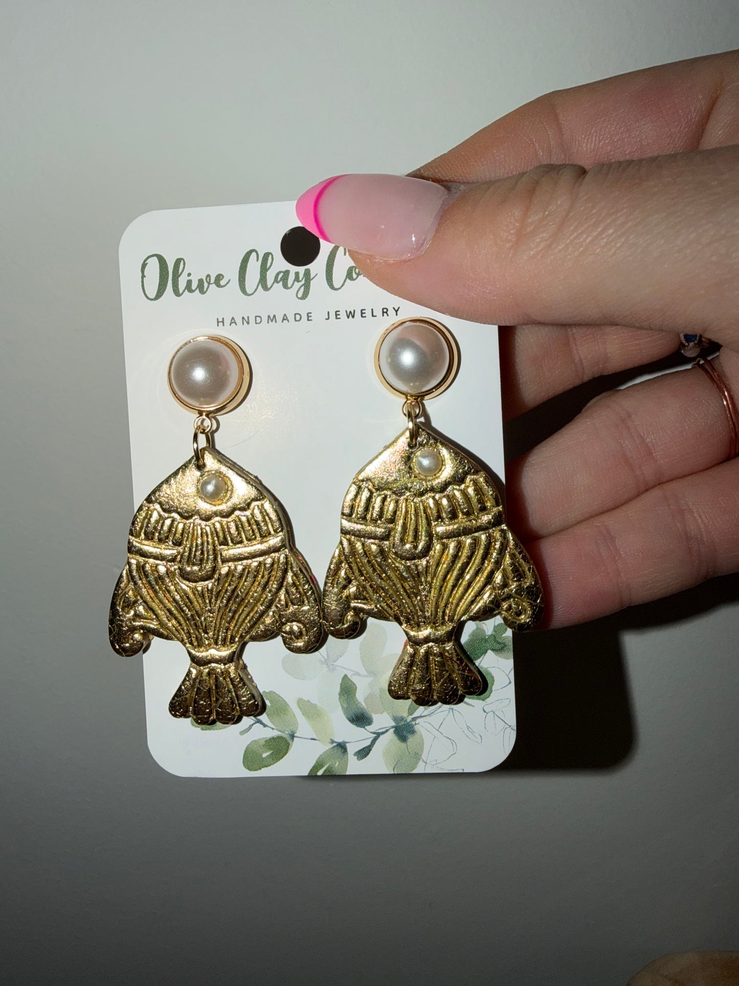 Gold leaf fish earrings