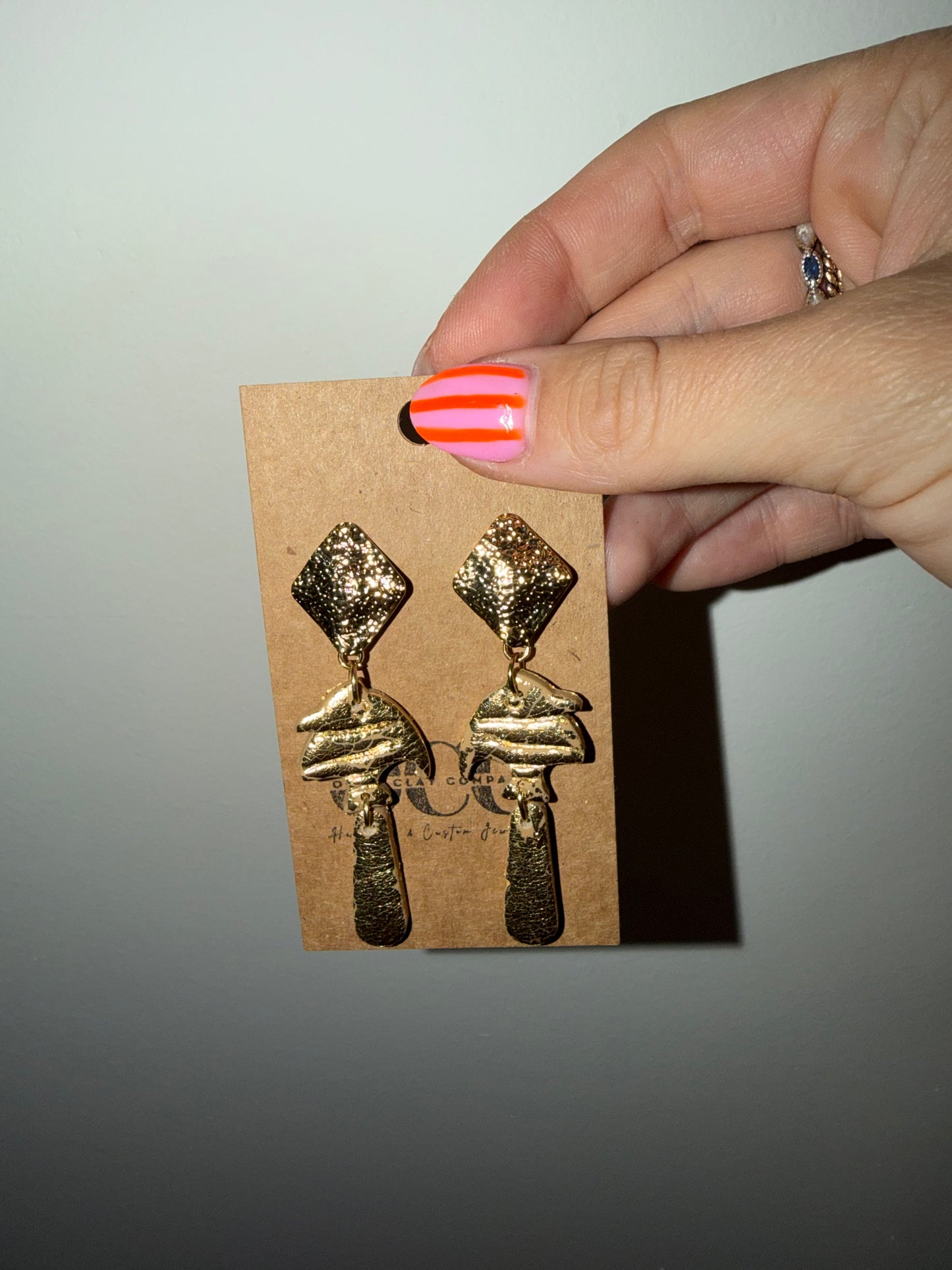 Gold leaf fish earrings