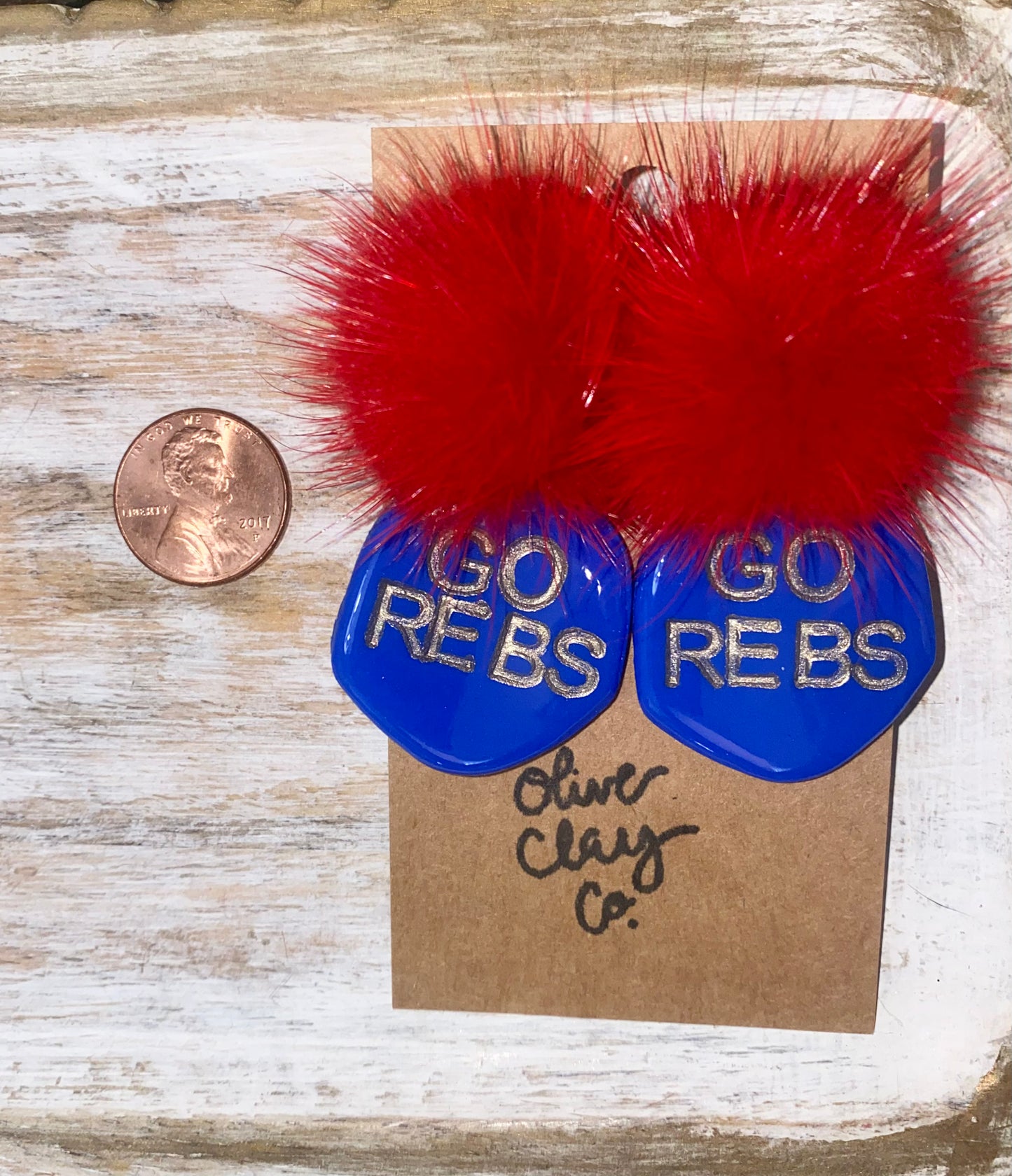 Go Rebs Pom Earrings