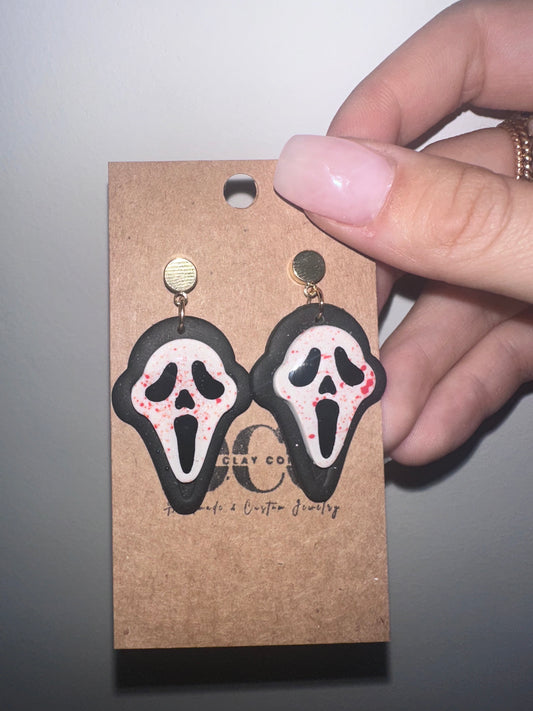 Scream dangle earrings with blood