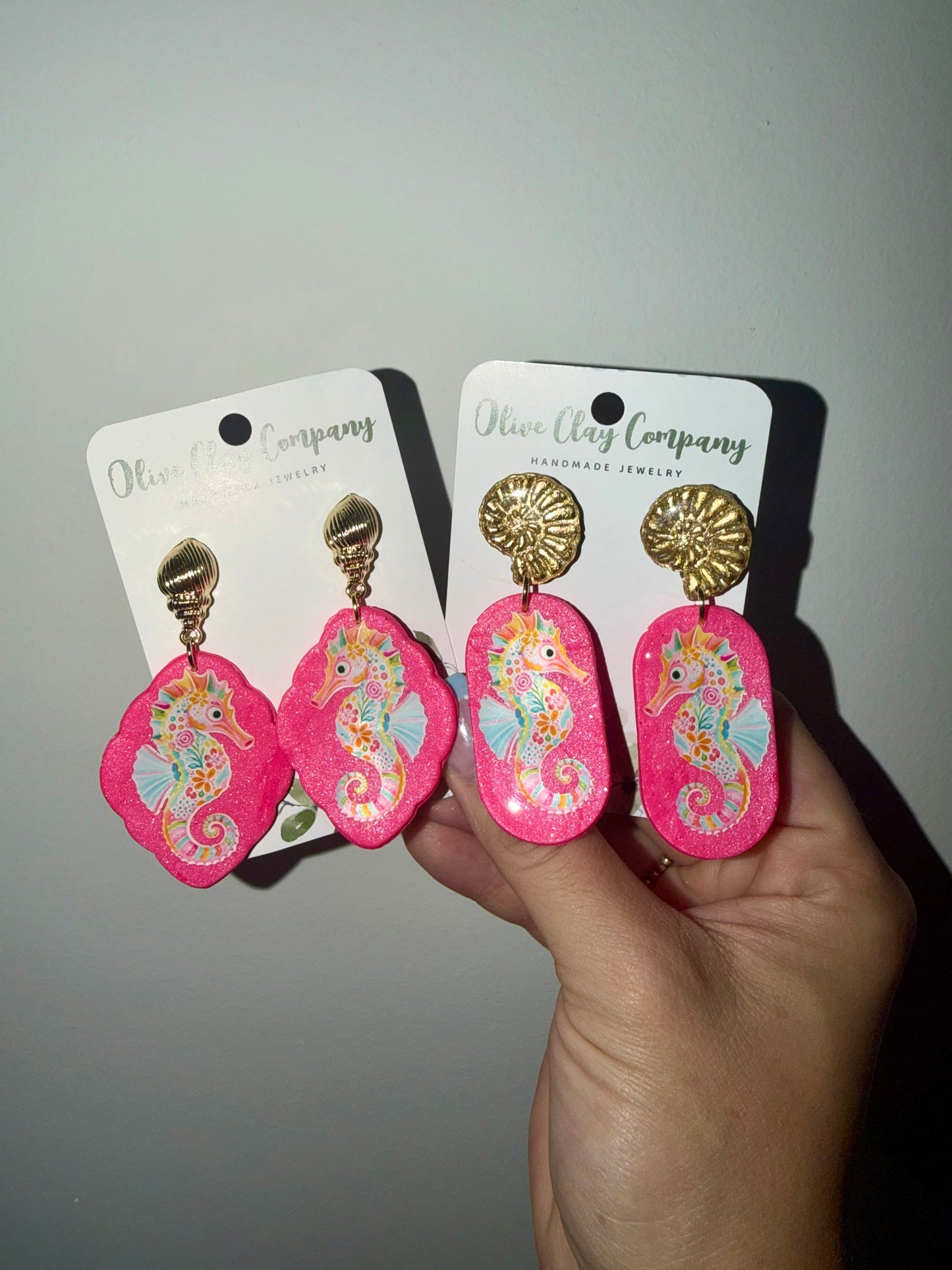 Oval sea horse clay earrings with clay large shell topper