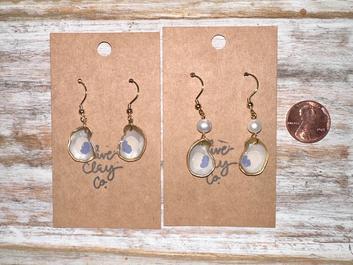 Small oyster dangle earrings