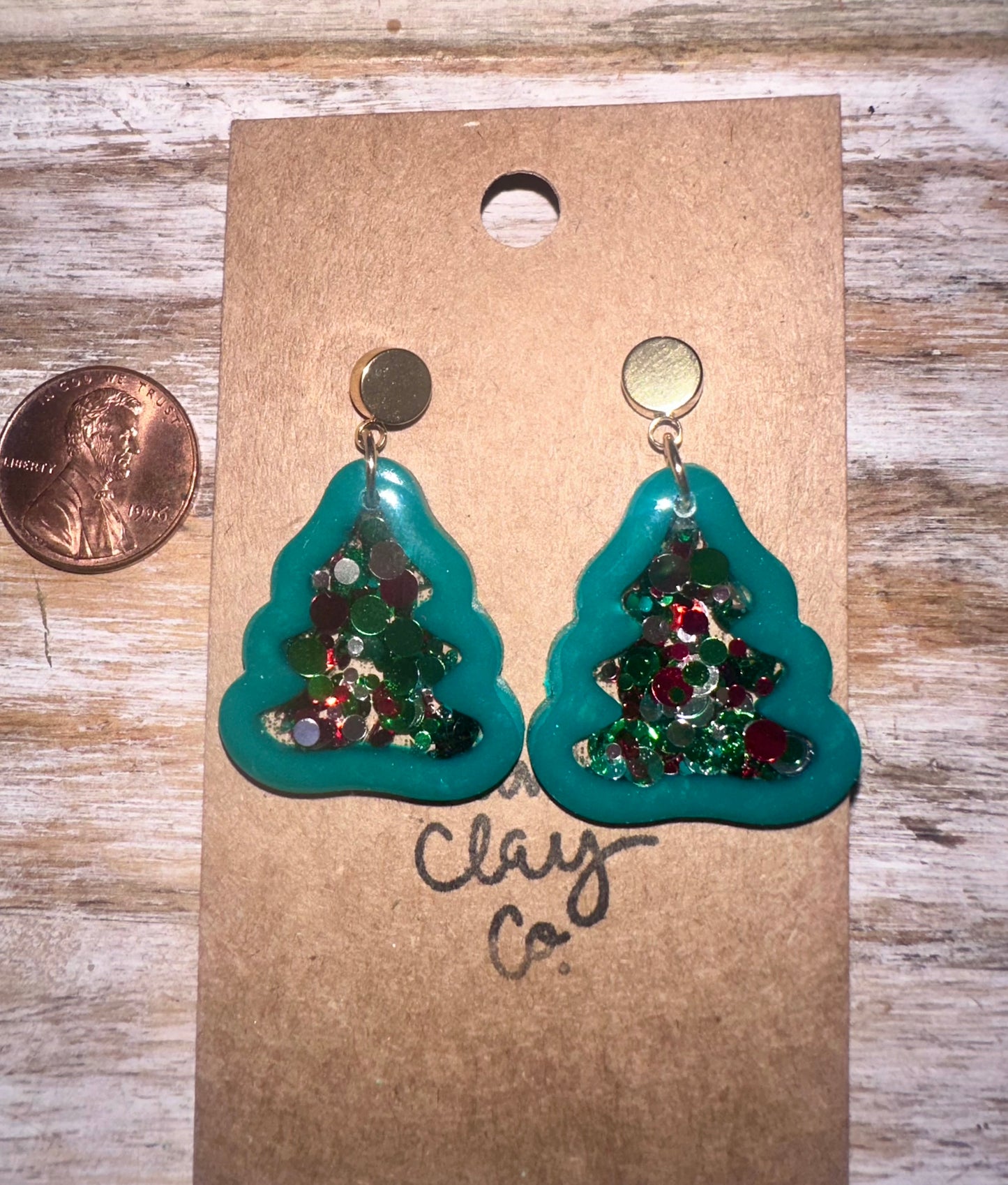 Small clay and resin Christmas trees