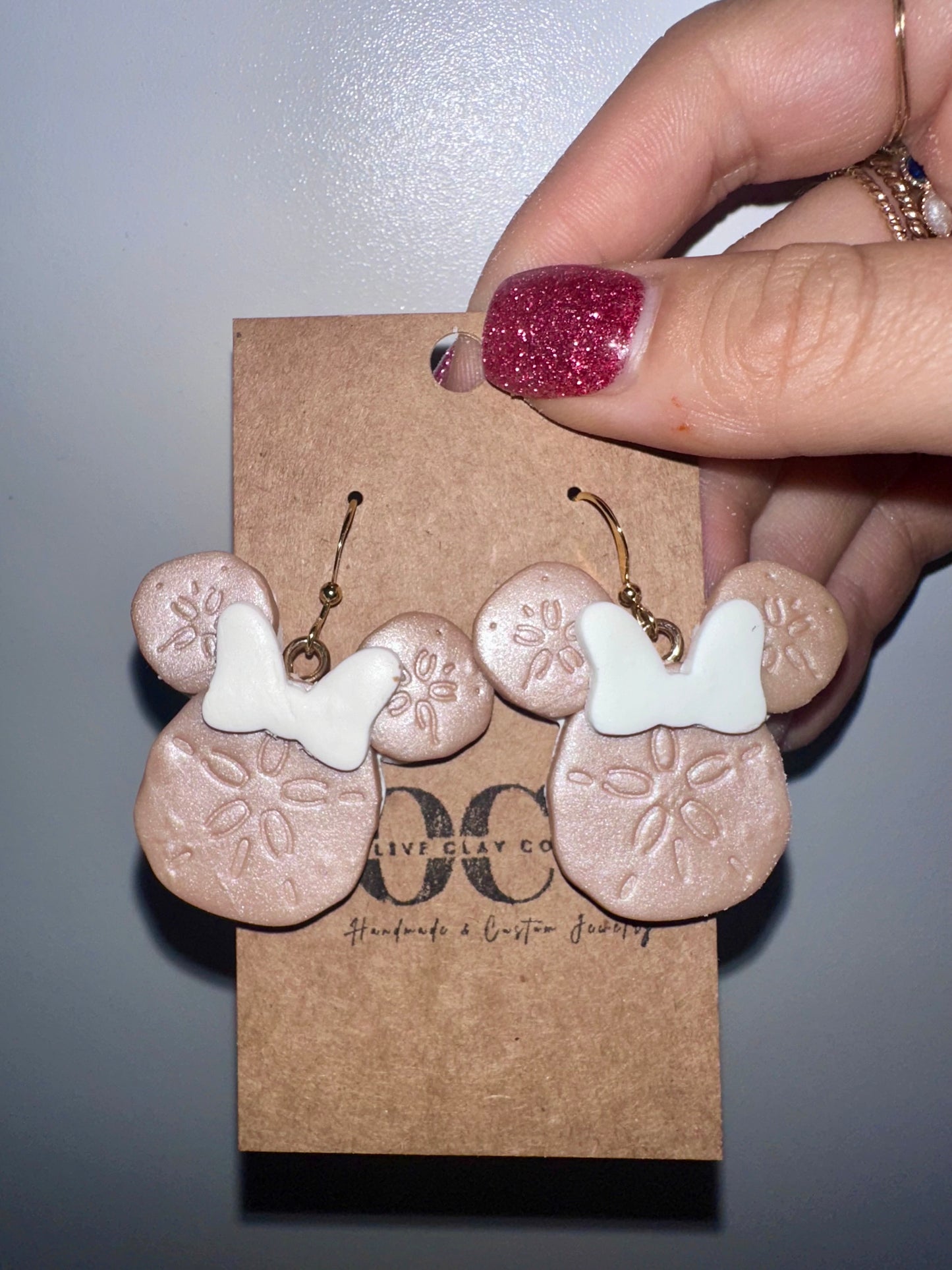 Mouse sand dollar earrings