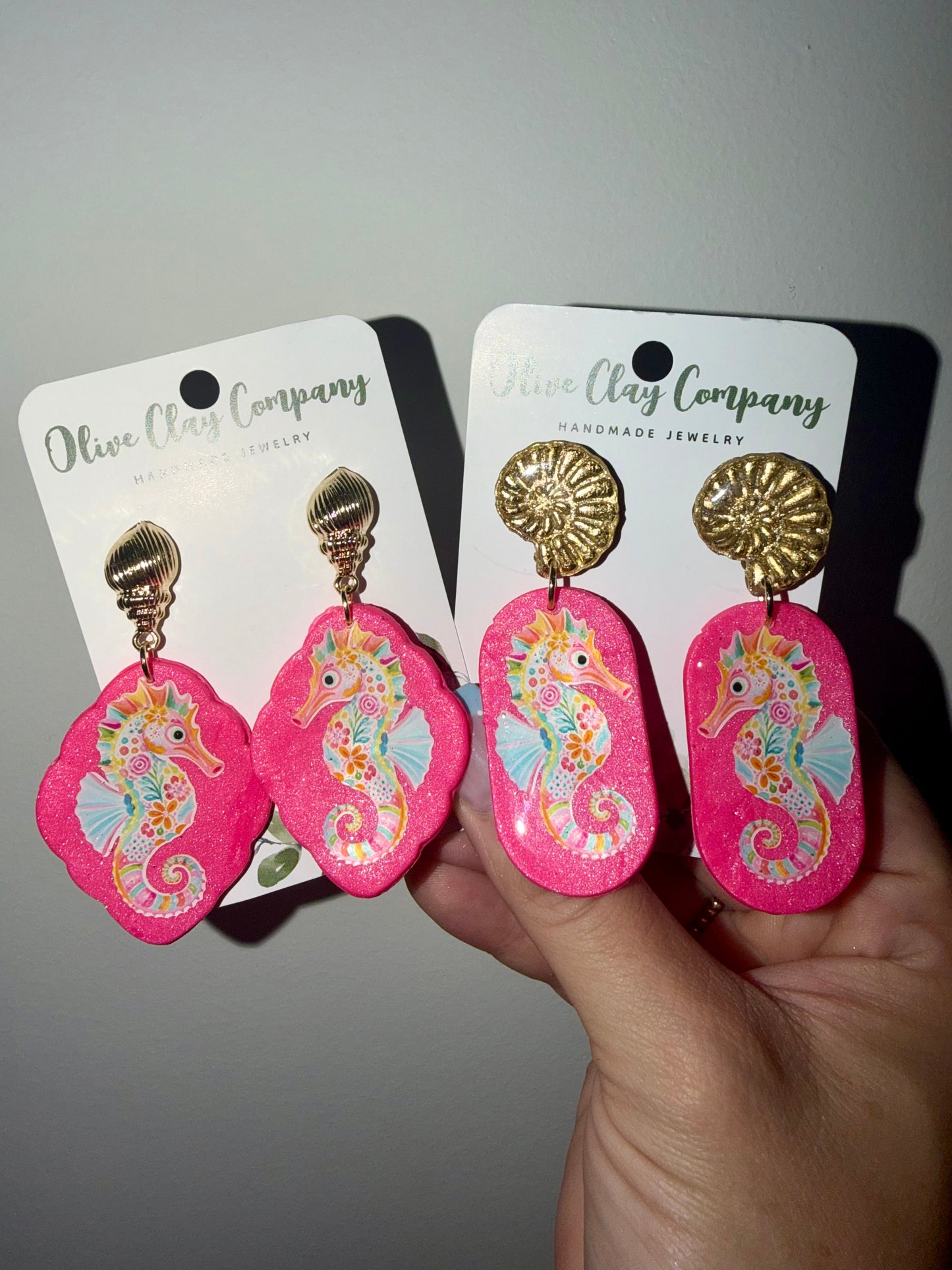 Quatrefoil sea horse clay earrings with metal shell topper