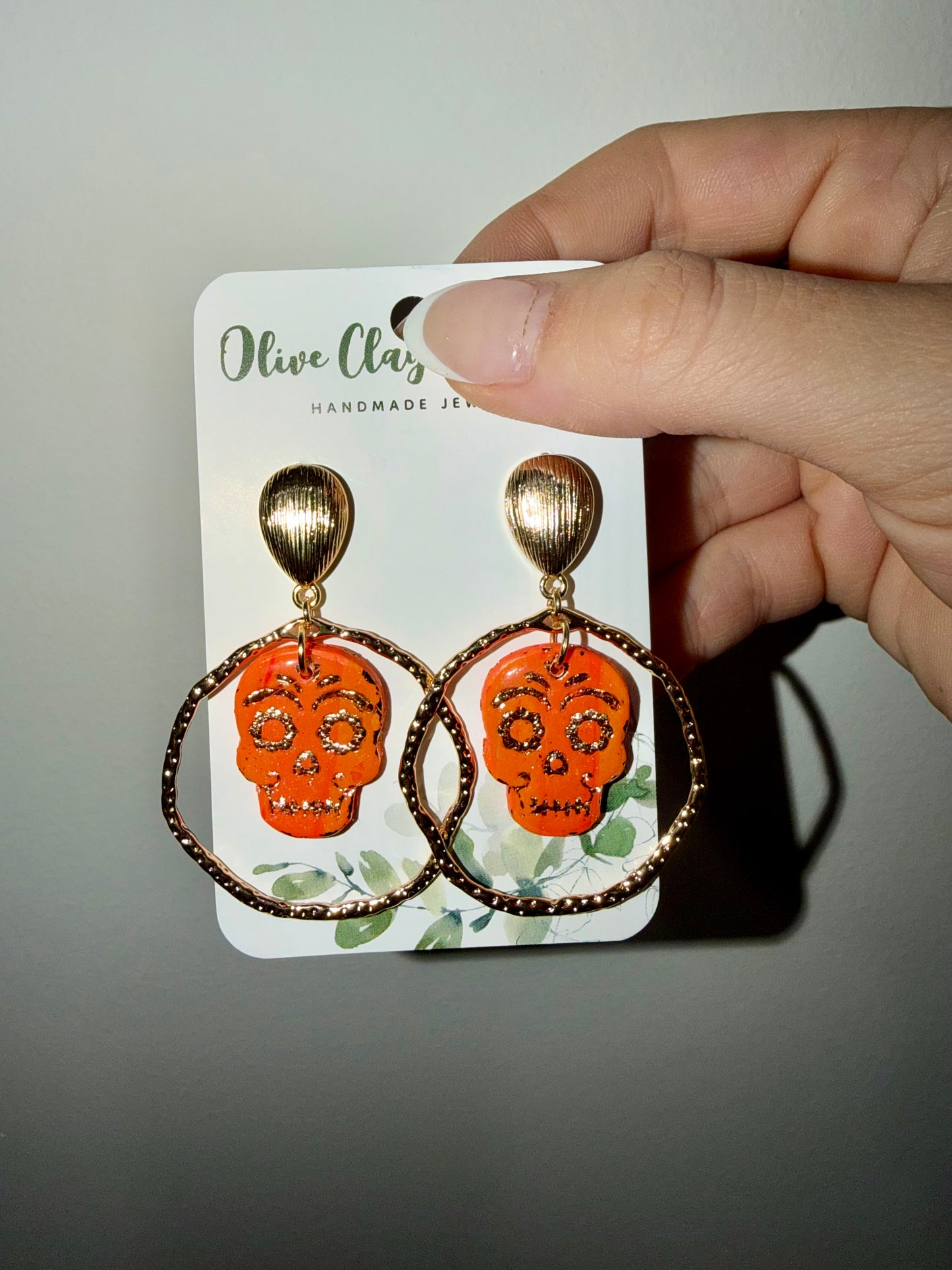 Pink/orange skull earrings