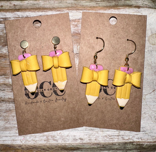 Bow pencil earrings