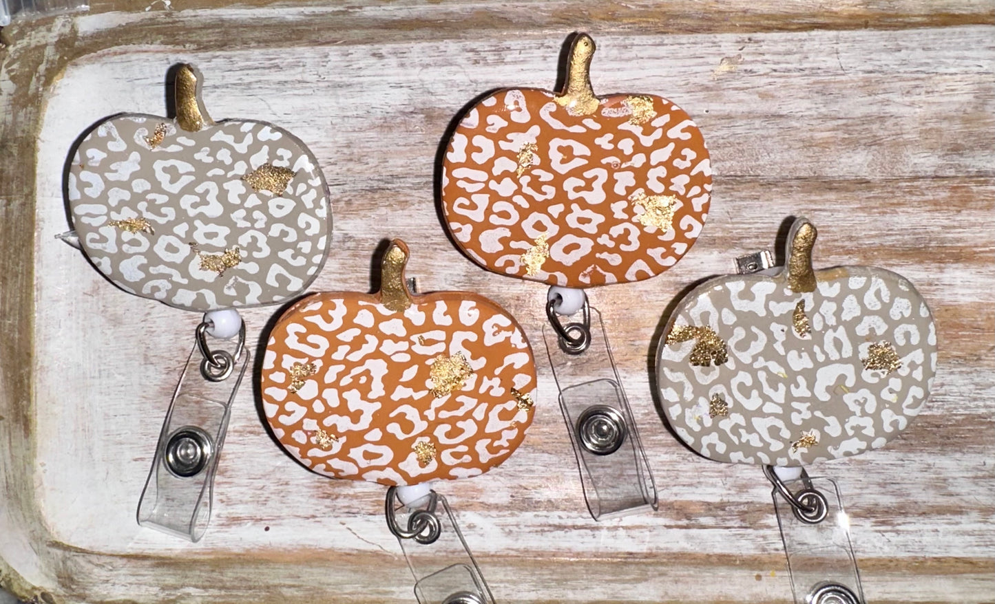 Large cheetah pumpkin badge reel