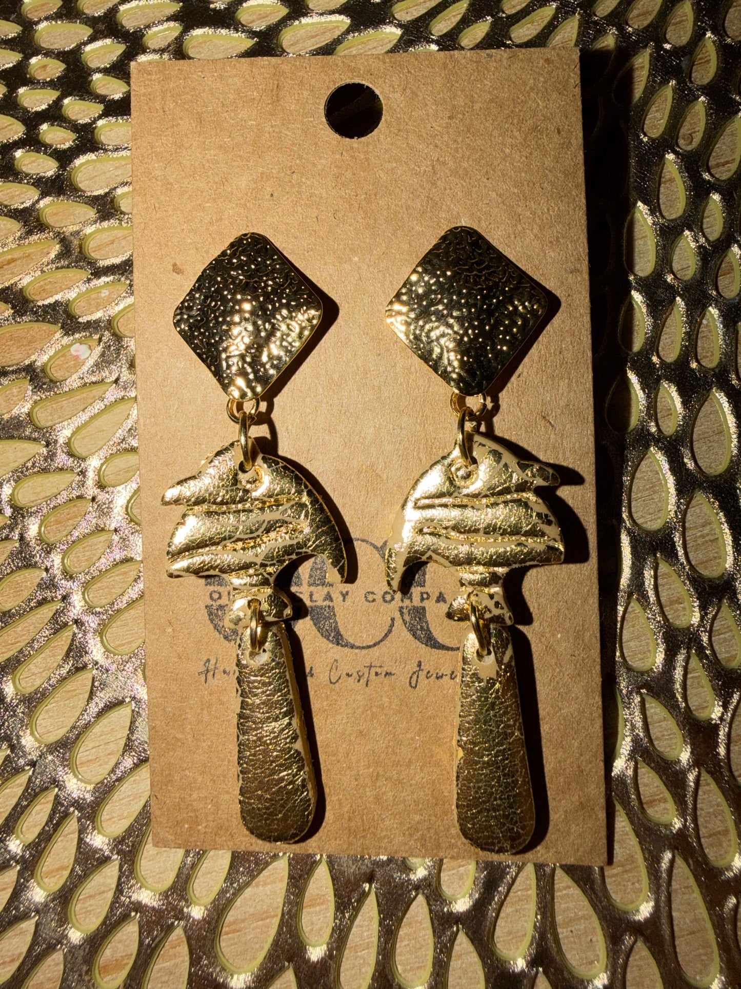 Gold leaf fish earrings