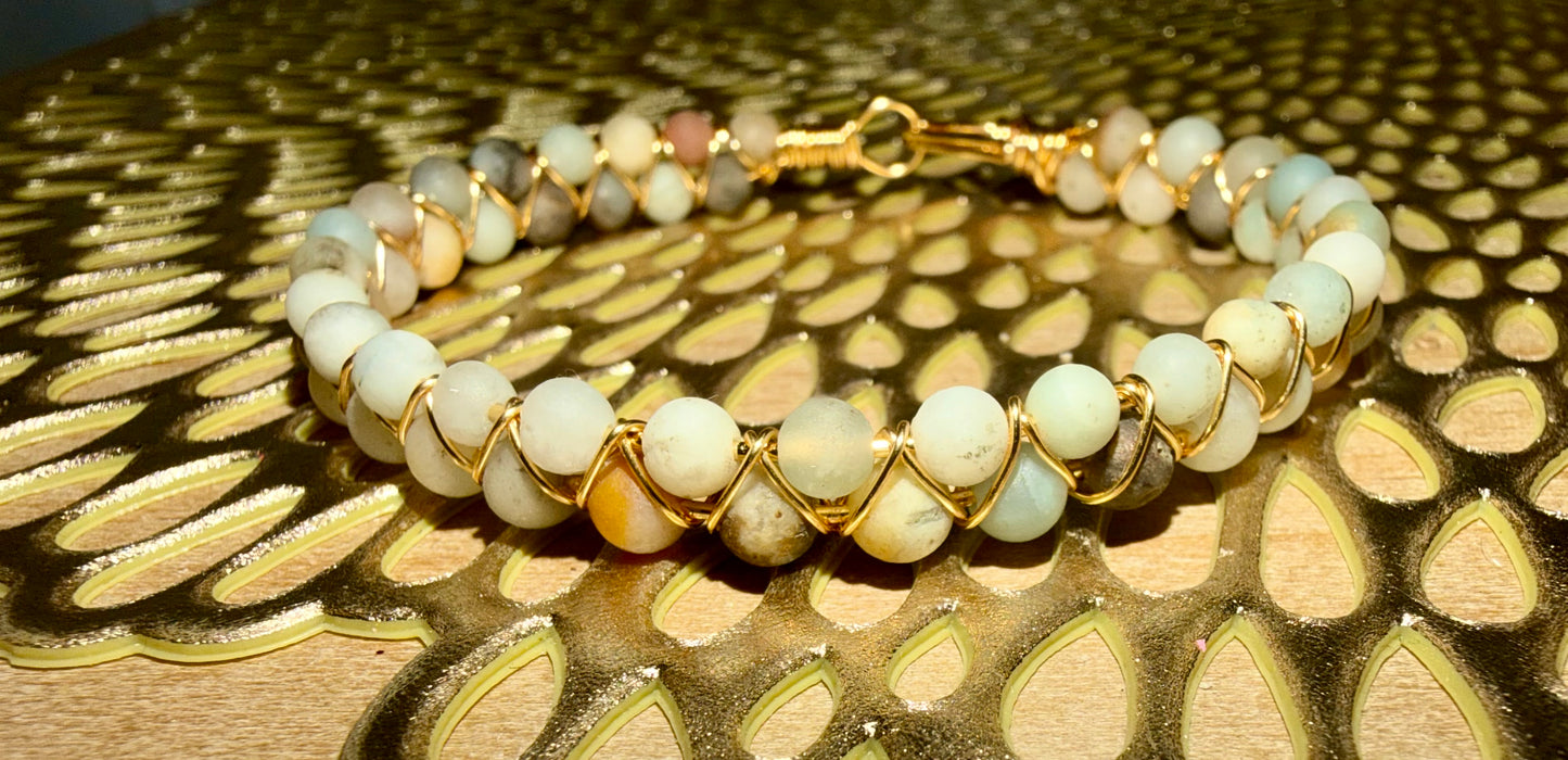 Double multi color neutrals beaded gold plated wire bracelet
