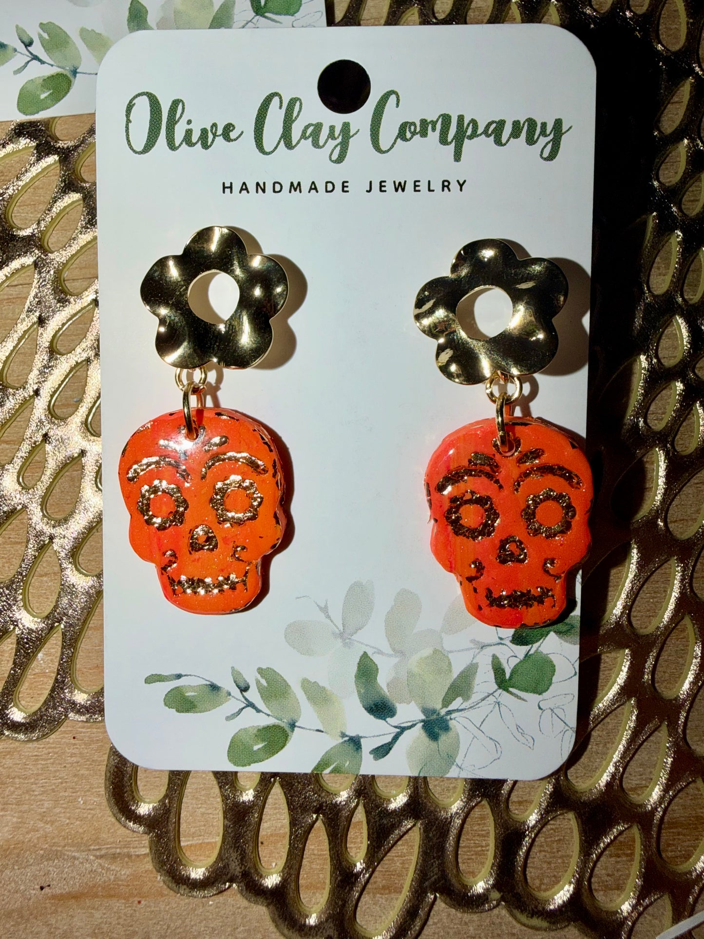 Pink/orange skull earrings