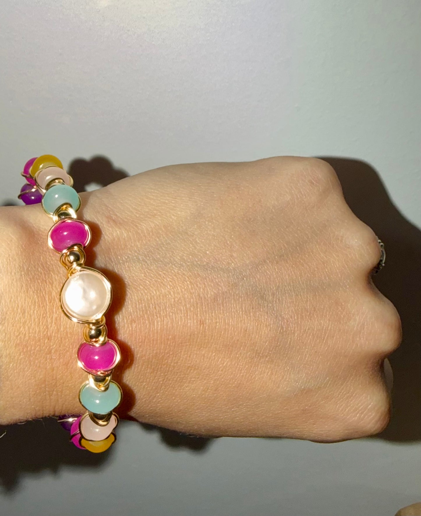 Rondelle beads wire bracelet with gold spacer beads