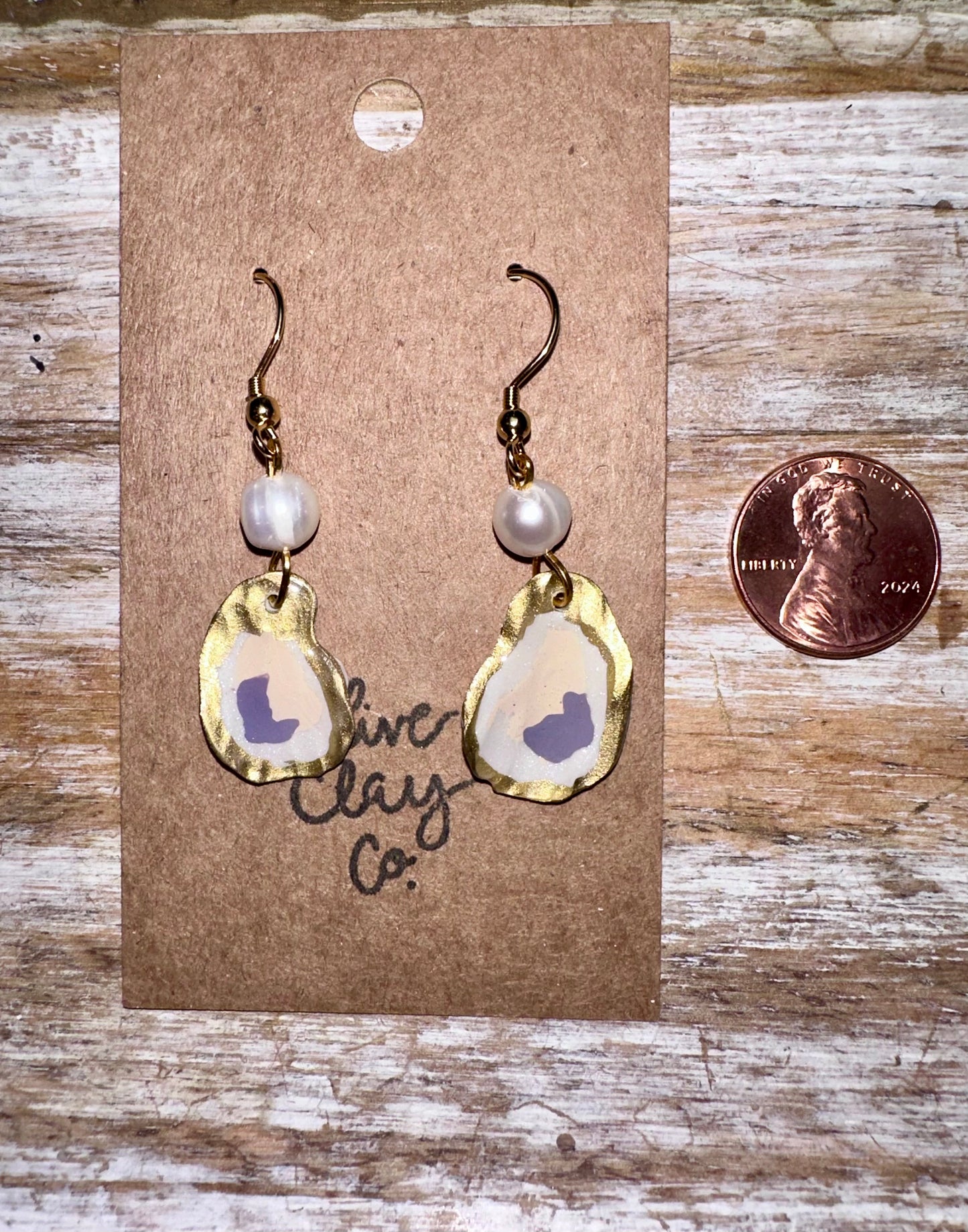 Small oyster dangle earrings