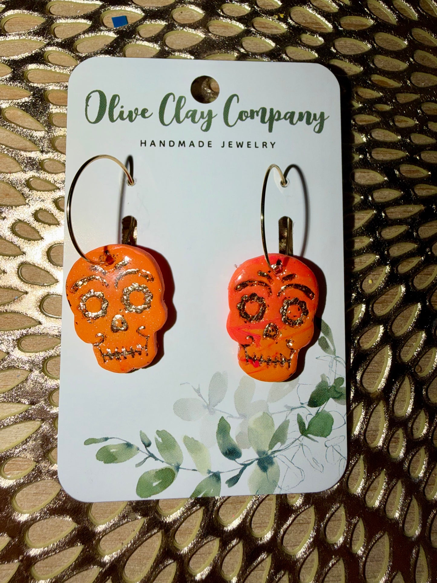 Pink/orange skull earrings