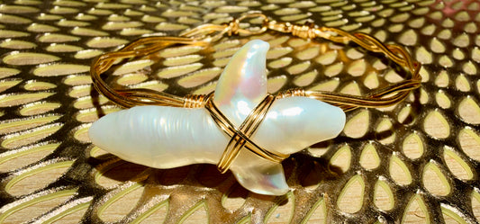 Large freshwater pearl cross gold plated wire bracelet