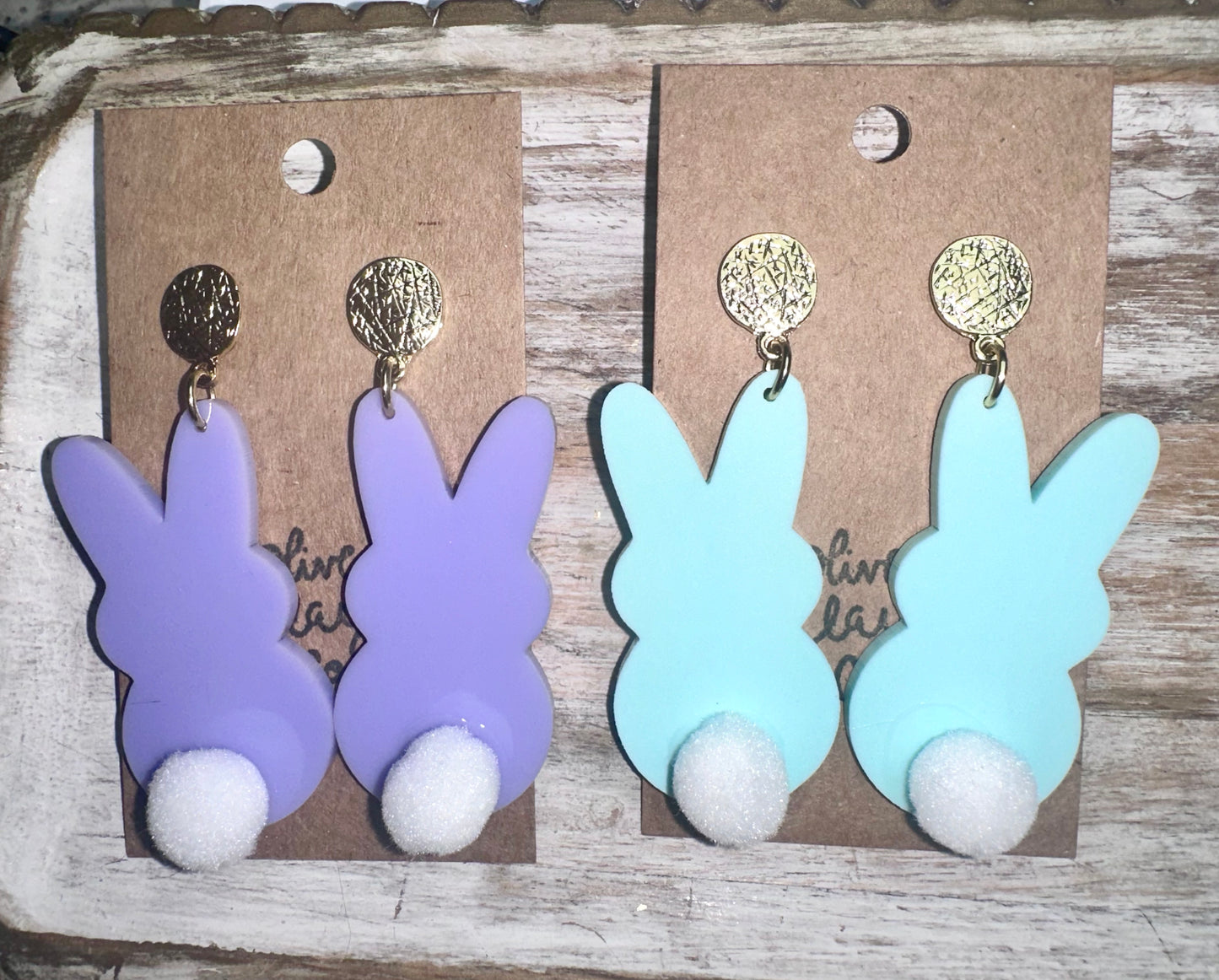 Large peep Pom earrings