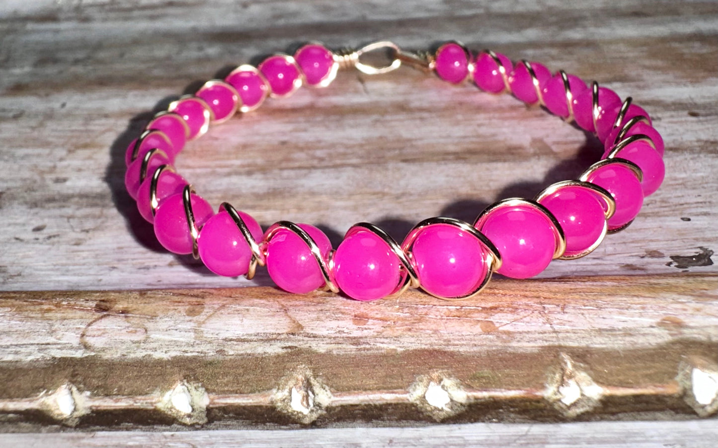 Hot pink beaded wire bracelet