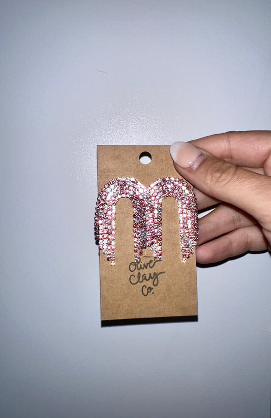 Bedazzled pink arch earrings